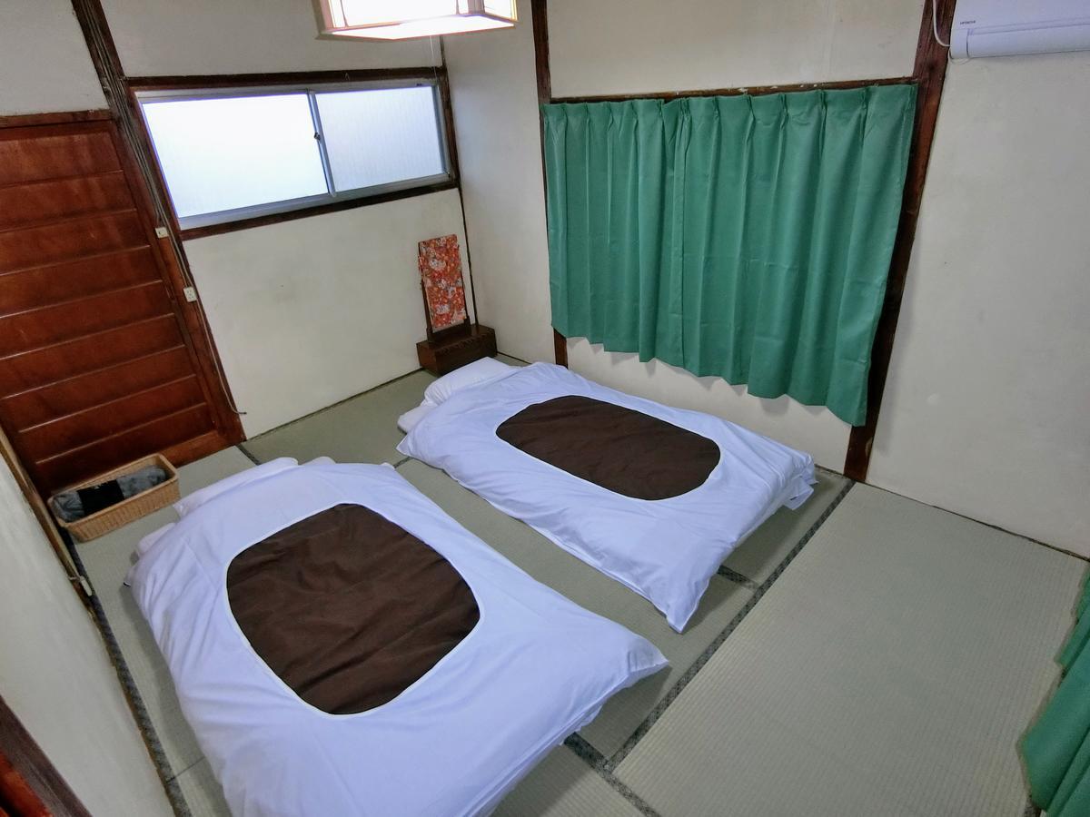 Guesthouse Tabimakura Beppu Bagian luar foto
